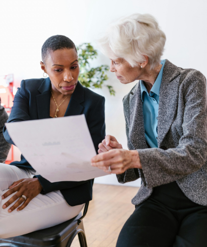 A financial advisor advising an elderly lady